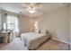 Bright bedroom with carpet flooring, a ceiling fan, and a vanity at 1226 Clingman Dr, Fort Mill, SC 29715