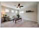 Bonus room with neutral carpet, a ceiling fan, and natural light at 1226 Clingman Dr, Fort Mill, SC 29715