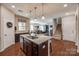 Open kitchen area with a view of the staircase and living area at 1226 Clingman Dr, Fort Mill, SC 29715
