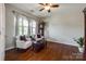 Comfortable living room featuring hardwood floors, natural light, and tasteful decor at 1226 Clingman Dr, Fort Mill, SC 29715