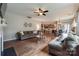 Spacious open-concept living room with hardwood floors and ample natural light at 1226 Clingman Dr, Fort Mill, SC 29715