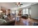 Inviting living area with hardwood floors and open floor plan to the kitchen at 1226 Clingman Dr, Fort Mill, SC 29715
