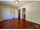 Large bedroom with closet storage and access to the ensuite bathroom at 1745 Matheson Ave, Charlotte, NC 28205