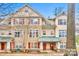 Charming townhouse with well-maintained landscaping and inviting front porch at 1745 Matheson Ave, Charlotte, NC 28205