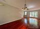 Spacious living room featuring hardwood floors and modern lighting at 1745 Matheson Ave, Charlotte, NC 28205