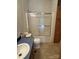 Bathroom featuring a shower with sliding glass doors and blue countertop sink at 196 Cindy Ln, Kings Mountain, NC 28086