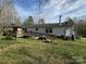 Back of home featuring a deck and ramp for easy access at 196 Cindy Ln, Kings Mountain, NC 28086