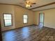 Spacious main bedroom with wood floors, ceiling fan, and natural light at 196 Cindy Ln, Kings Mountain, NC 28086