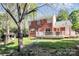 Backyard with a deck, a small white porch house, and a tree with a swing at 200 Port Royal Dr, Matthews, NC 28105