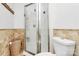 Bathroom with a glass-enclosed shower and a toilet at 200 Port Royal Dr, Matthews, NC 28105
