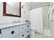 Well-lit bathroom with a marble countertop vanity and a shower-tub combination at 200 Port Royal Dr, Matthews, NC 28105