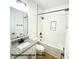 Clean and modern bathroom featuring white subway tile and black fixtures in the shower and vanity at 210 Carolina Dr # 1000&999, Troy, NC 27371