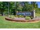 Entrance sign for the Carolina Forest community, surrounded by manicured landscaping and greenery at 210 Carolina Dr # 1000&999, Troy, NC 27371