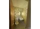 Half bathroom showcases vintage floral wallpaper and tile flooring, featuring a toilet and sink at 215 Suncrest Rd, Cherryville, NC 28021