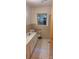 Bathroom featuring neutral tile, a toilet, vanity, and tub/shower combination at 215 Suncrest Rd, Cherryville, NC 28021