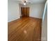 A bedroom with hardwood floors, ceiling fan, and closet at 215 Suncrest Rd, Cherryville, NC 28021