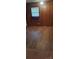 Bedroom with wood paneling, hardwood floors, and a cozy atmosphere at 215 Suncrest Rd, Cherryville, NC 28021