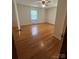 Bedroom with hardwood floors and a window providing natural light at 215 Suncrest Rd, Cherryville, NC 28021