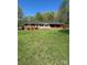 Charming single-story home with a brick exterior and a spacious front yard, perfect for outdoor activities at 215 Suncrest Rd, Cherryville, NC 28021