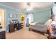 Bedroom showing a desk, ceiling fan, wooden bed frame, and adjacent bathroom for convenience at 2166 Potpourri Pt, Rock Hill, SC 29732