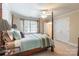 Serene bedroom featuring a four-poster bed, soft colors, and calming decor at 2166 Potpourri Pt, Rock Hill, SC 29732