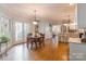 Charming dining area with natural light, hardwood floors, and seamless connection to the kitchen at 2166 Potpourri Pt, Rock Hill, SC 29732