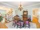 Elegant dining room featuring hardwood floors and staircase access at 2166 Potpourri Pt, Rock Hill, SC 29732