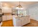 Open concept kitchen with a large island, stainless appliances, and plenty of cabinet space at 2166 Potpourri Pt, Rock Hill, SC 29732