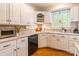 Well-appointed kitchen featuring granite countertops, tiled backsplash, and abundant natural light at 2166 Potpourri Pt, Rock Hill, SC 29732