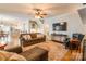 Spacious living room flows into the kitchen featuring hardwood floors and comfortable seating at 2166 Potpourri Pt, Rock Hill, SC 29732