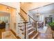 Traditional staircase with hardwood treads and white risers at 2166 Potpourri Pt, Rock Hill, SC 29732
