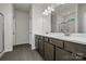 Bathroom with a double sink vanity, modern fixtures, and tiled floors at 2231 Catawba Trace Dr, Catawba, NC 28609