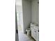 Bathroom featuring a single sink vanity with white cabinets and a tub with shower at 2231 Catawba Trace Dr, Catawba, NC 28609