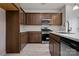 Modern kitchen with stainless steel appliances, wooden cabinets, and light countertops at 2231 Catawba Trace Dr, Catawba, NC 28609