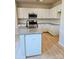 Modern kitchen with white cabinets, granite countertops, and stainless steel appliances at 2231 Catawba Trace Dr, Catawba, NC 28609