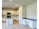 Bright kitchen featuring white cabinetry, granite countertops, and an island with a sink at 2231 Catawba Trace Dr, Catawba, NC 28609