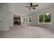 Open-concept living room and kitchen area with hardwood floors and ample natural light at 2231 Catawba Trace Dr, Catawba, NC 28609