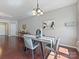 Formal dining room featuring modern lighting and hardwood floors, perfect for Gathering gatherings at 2268 Kensington Station Pkwy, Charlotte, NC 28210