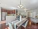 Open concept living space with kitchen, dining area, and a cozy living room at 2268 Kensington Station Pkwy, Charlotte, NC 28210