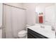 Practical bathroom featuring a combined toilet, sink and shower/tub at 2410 Dr Carver Rd, Charlotte, NC 28208