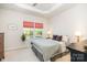Cozy bedroom featuring neutral tones, large windows, and a comfortable bed at 2410 Dr Carver Rd, Charlotte, NC 28208