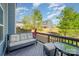 Relaxing deck with outdoor furniture and a view of the backyard and neighboring homes at 2410 Dr Carver Rd, Charlotte, NC 28208