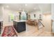 Spacious kitchen with open layout, flowing into the dining and living areas, perfect for entertaining at 2410 Dr Carver Rd, Charlotte, NC 28208