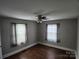 Spacious bedroom featuring natural light and modern fan at 2607 Lowell Rd, Gastonia, NC 28054