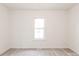 Clean bedroom with natural light, perfect for relaxing or unwinding at 2616 Holton Ave, Charlotte, NC 28208