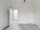 Sunlit bedroom boasts fresh paint, updated flooring, and a spacious closet at 2616 Holton Ave, Charlotte, NC 28208