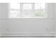 Well-lit room featuring a large window providing ample natural light at 2616 Holton Ave, Charlotte, NC 28208