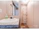 Bathroom featuring a modern faucet, stylish sink and shelving for added storage at 2923-1 G B Blanton Rd, Shelby, NC 28152