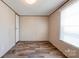 Cozy bedroom featuring laminate flooring and a bright window at 2923-1 G B Blanton Rd, Shelby, NC 28152