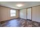 Bedroom with a window, wood-look flooring and neutral walls and trim at 2923-1 G B Blanton Rd, Shelby, NC 28152